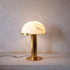 Beautiful table lamp featuring brass and marble. Modern design meets timeless elegance inspired by Art Deco. Perfect for any room.